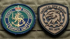 Woven and PVC military patches on a tactical army jacket